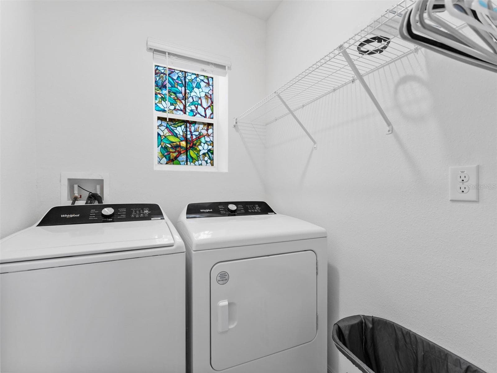 Indoor laundry room on the way to the garage - 5782 HOLLINGWORTH TRL, WESLEY CHAPEL