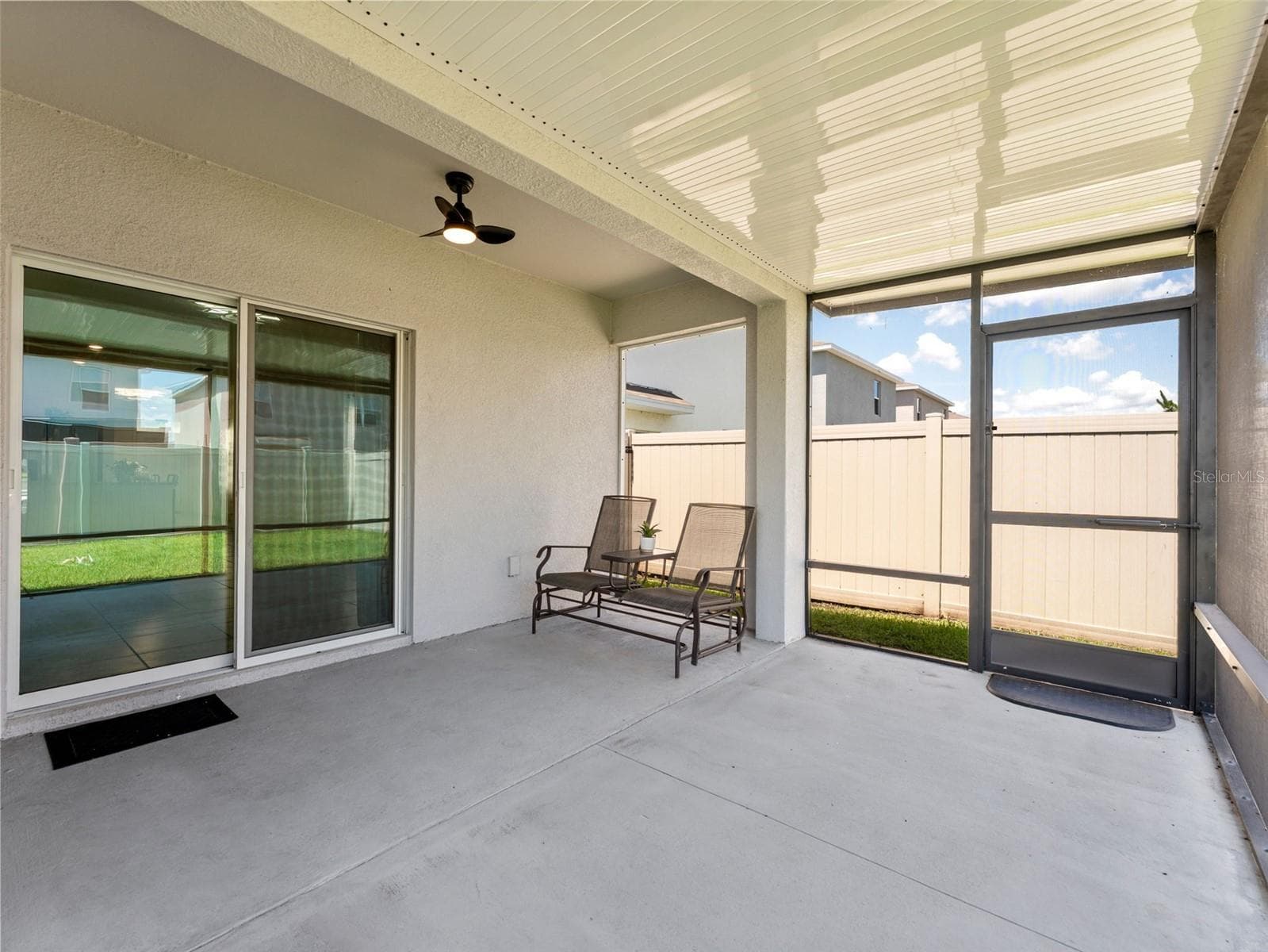 Extended covered, screened in patio - 5782 HOLLINGWORTH TRL, WESLEY CHAPEL
