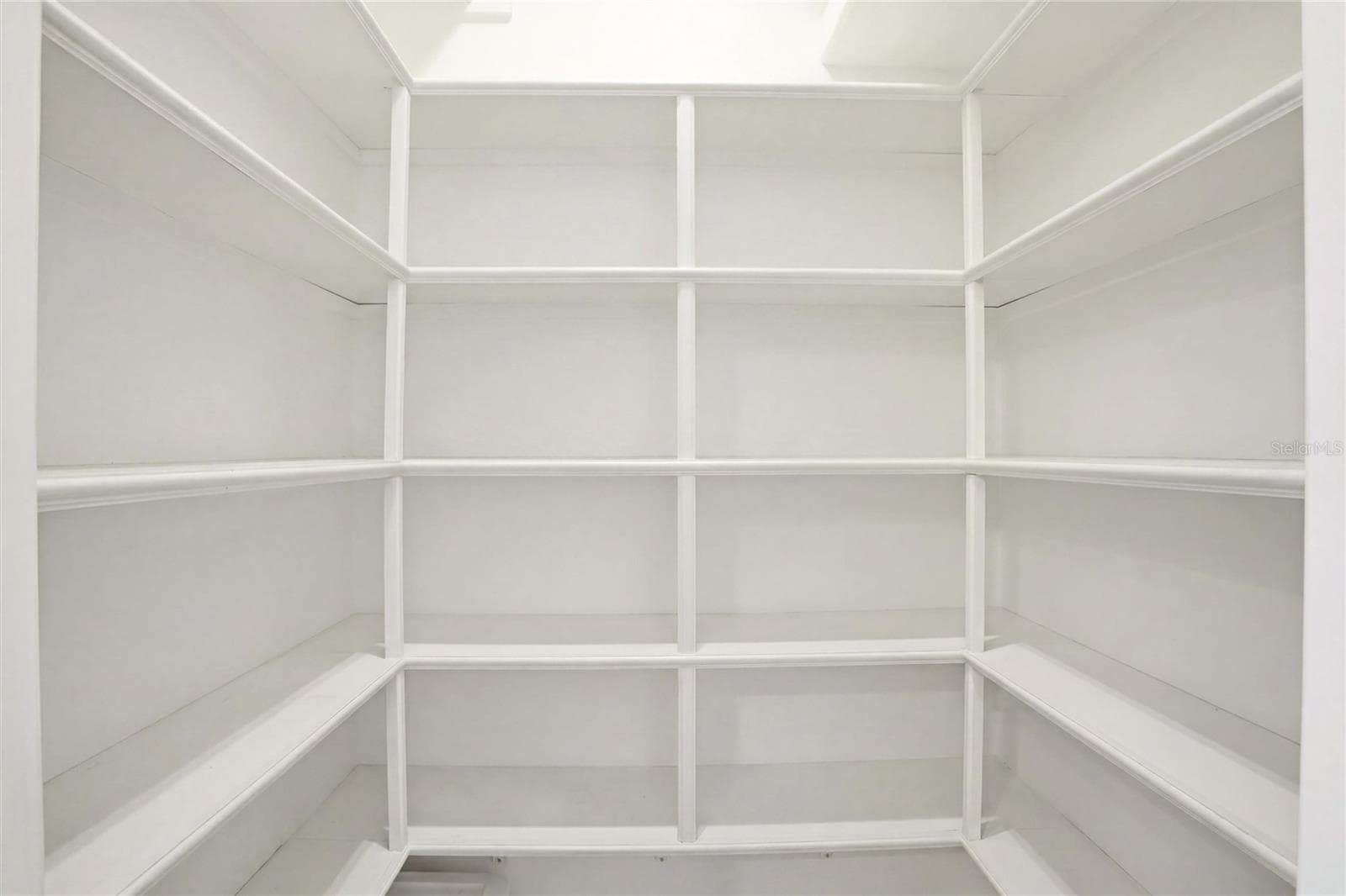 Pantry enclosed by glass doors - 7524 WESTMORELAND DR, SARASOTA