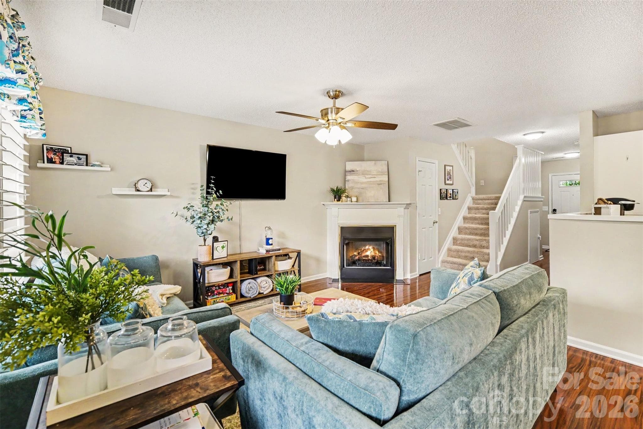 Family room with gas log fireplace - 9725 Mattforest Circle, Charlotte