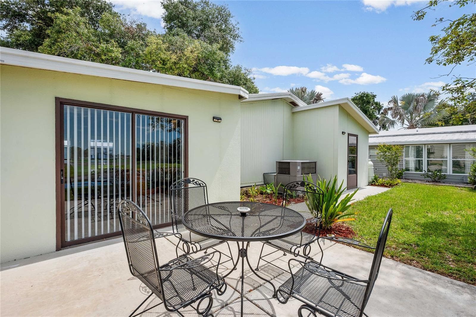 Backyard patio. - 36428 MALIBU WAY, ZEPHYRHILLS