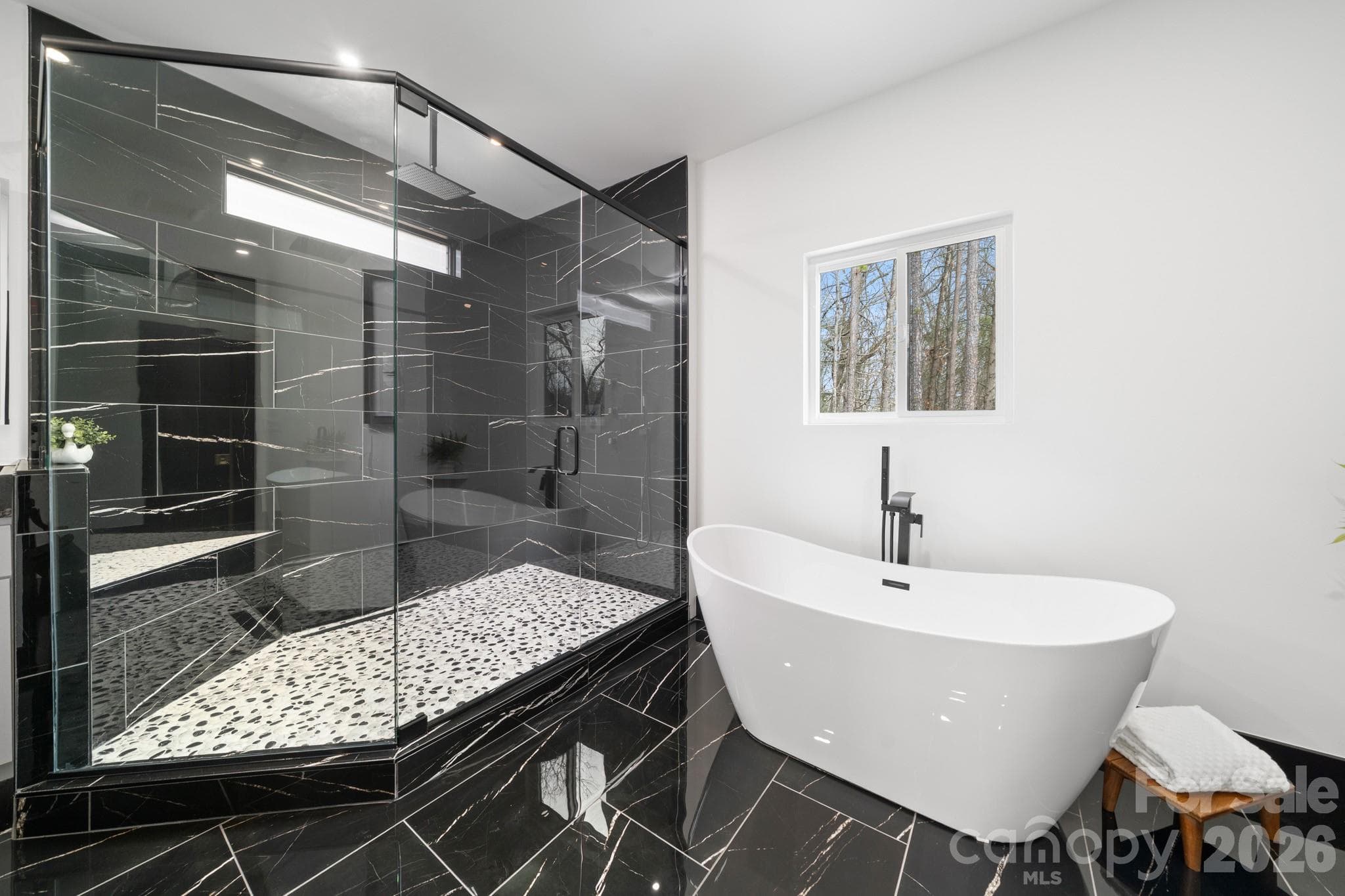 Primary bathroom, soaker tub and walk in shower and rainfall showerhead - 74 Jeranna Road, Mills River