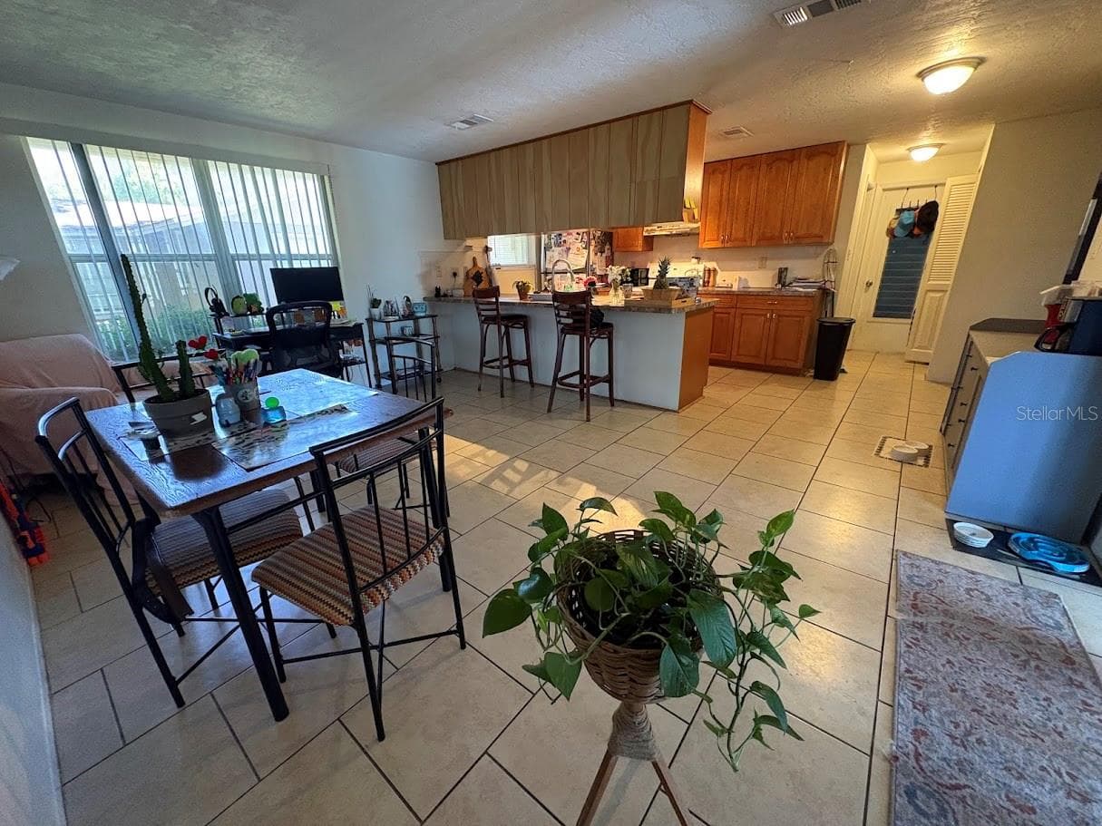 Kitchen from Family Room - 8220 FOX HOLLOW DR, PORT RICHEY