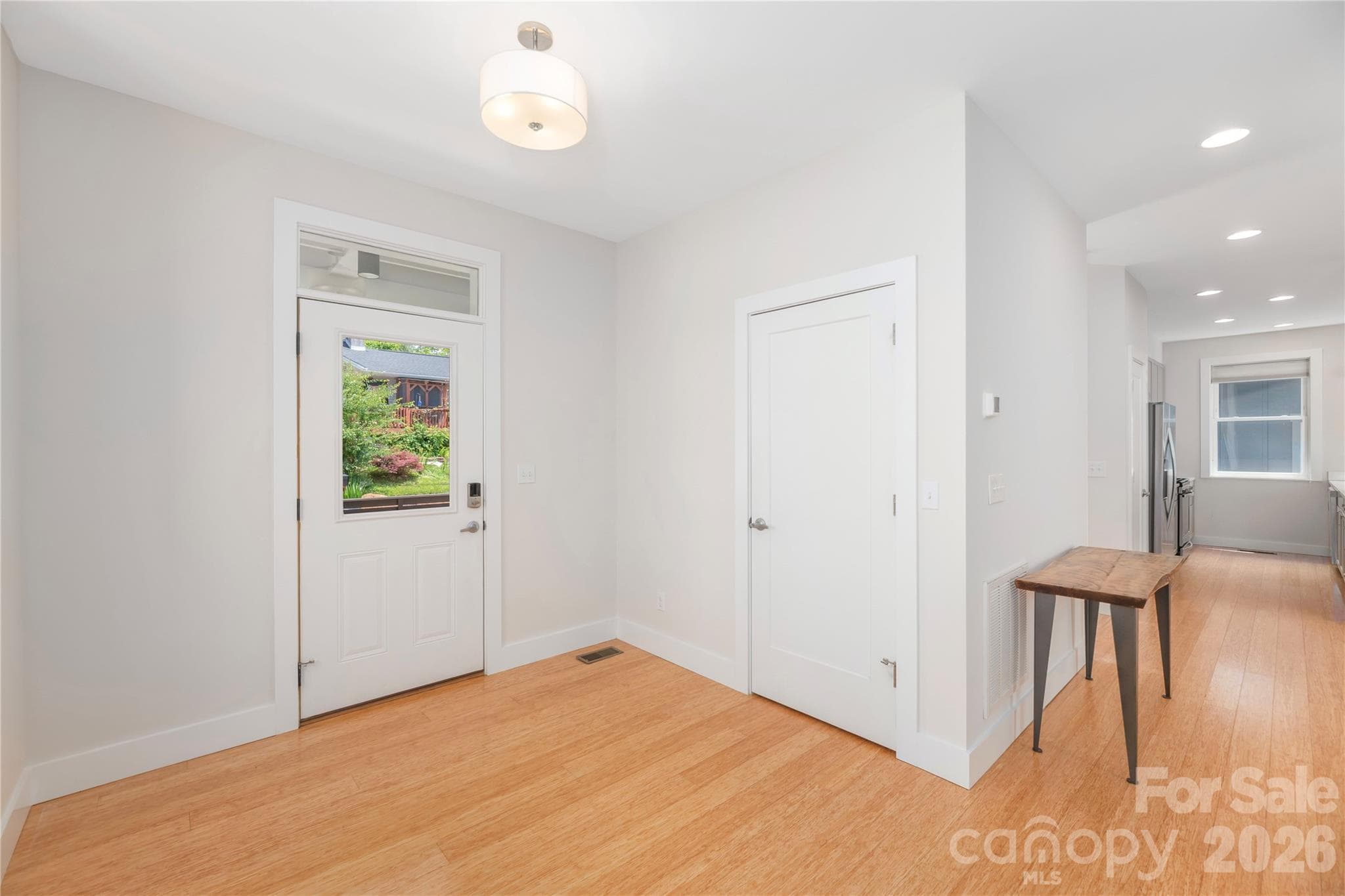 Inviting and light-filled foyer. - 39 Hubbard Avenue, Asheville