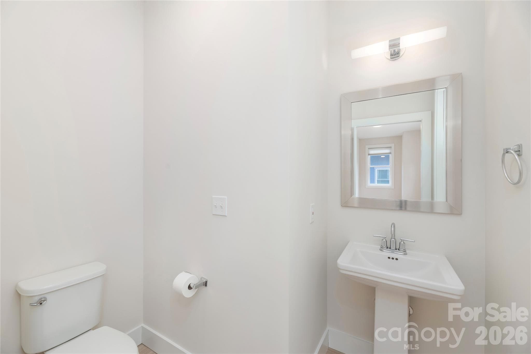 Half bathroom on the main level. - 39 Hubbard Avenue, Asheville