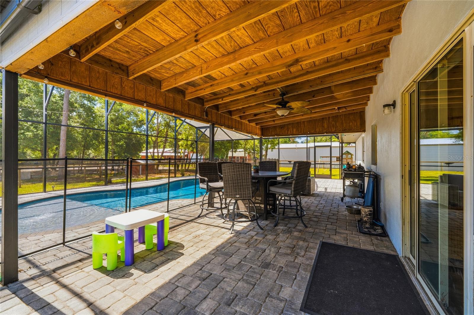 Covered Patio Area - 135 LINDA SUE DR, LAKE HELEN