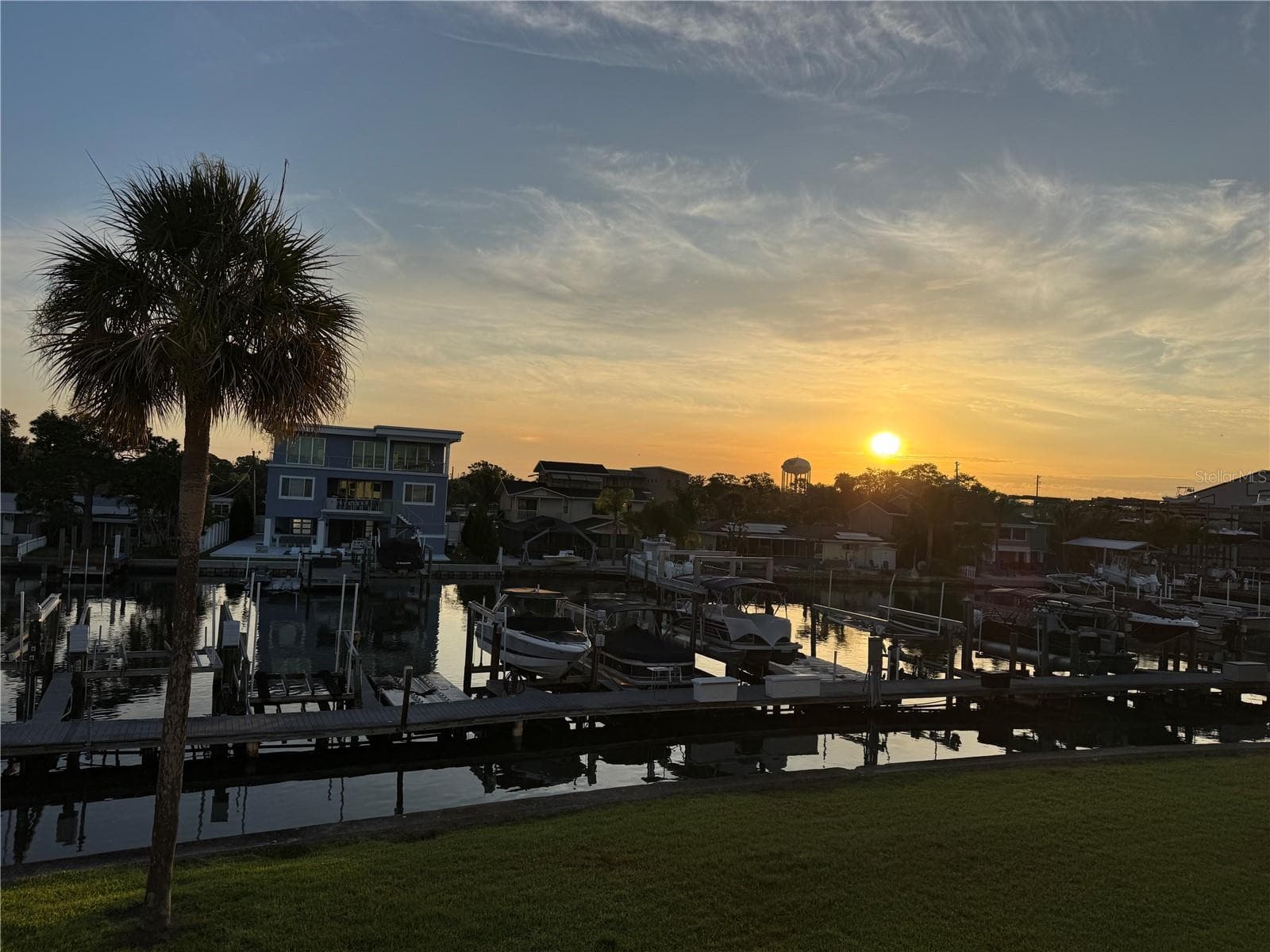 Breathtaking sunset from any of the rear windows and patios at this amazing property! - 2395 HANOVER DR, DUNEDIN