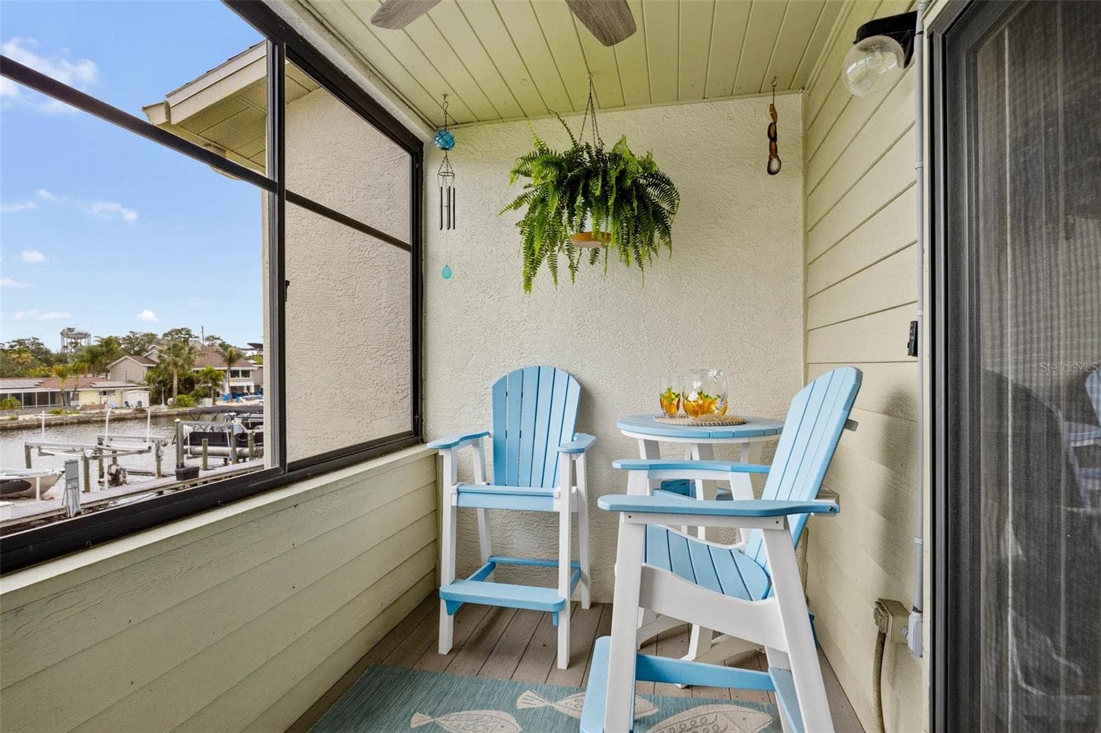 Main level balcony right off of the main Living Room & Kitchen - 2395 HANOVER DR, DUNEDIN