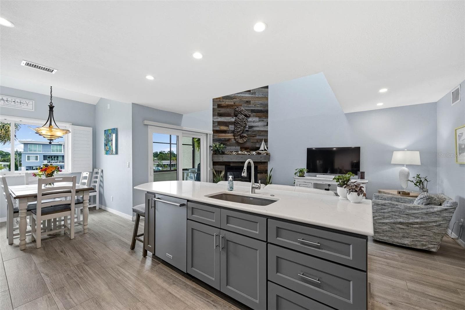 Fully renovated kitchen with double sided cabinets at the Island. - 2395 HANOVER DR, DUNEDIN