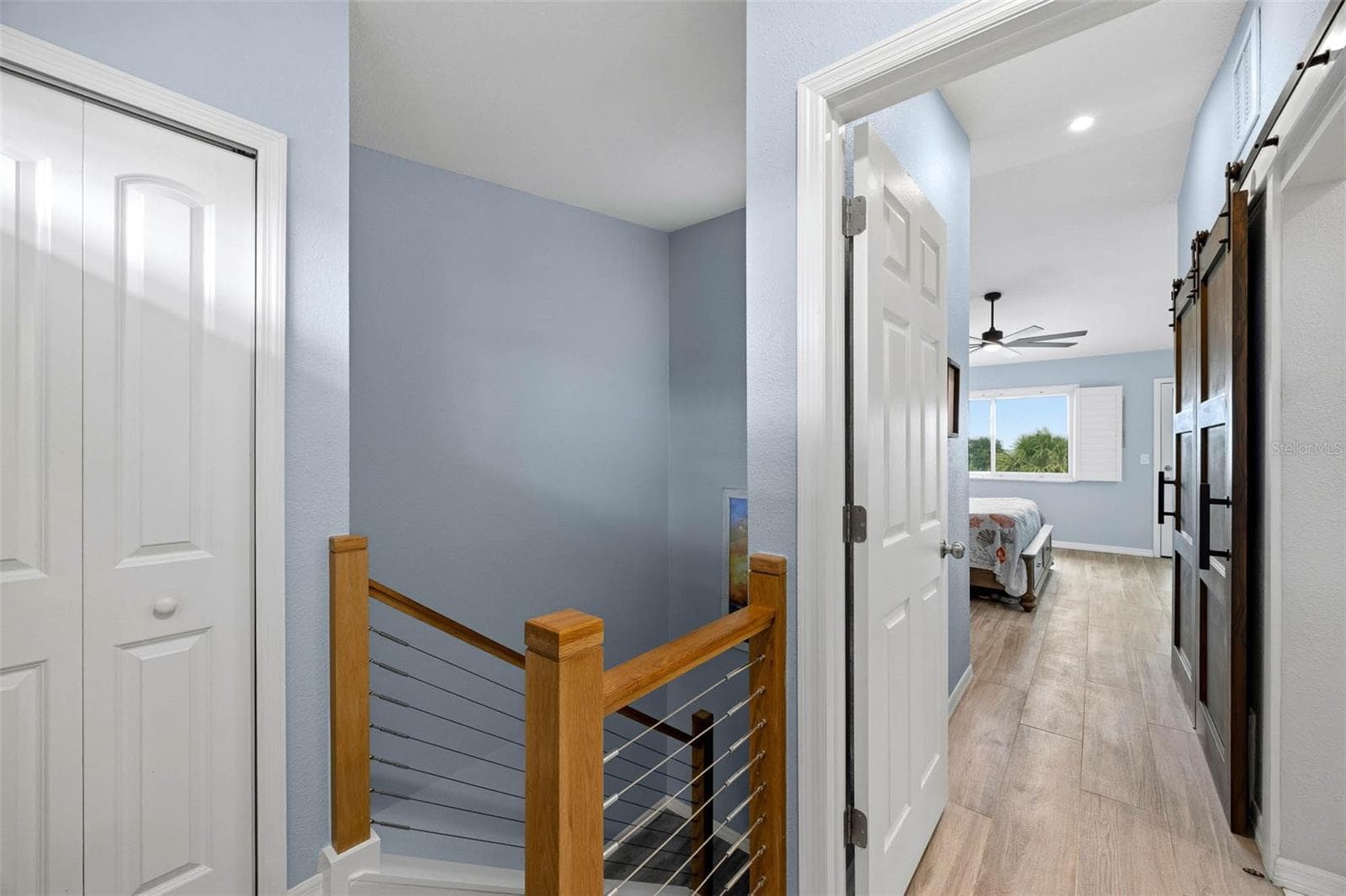 Primary suite landing area - 2395 HANOVER DR, DUNEDIN