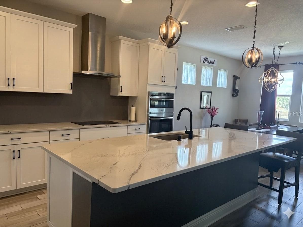 Great room and dinning room on right - 12571 NIGHT VIEW DR, SARASOTA