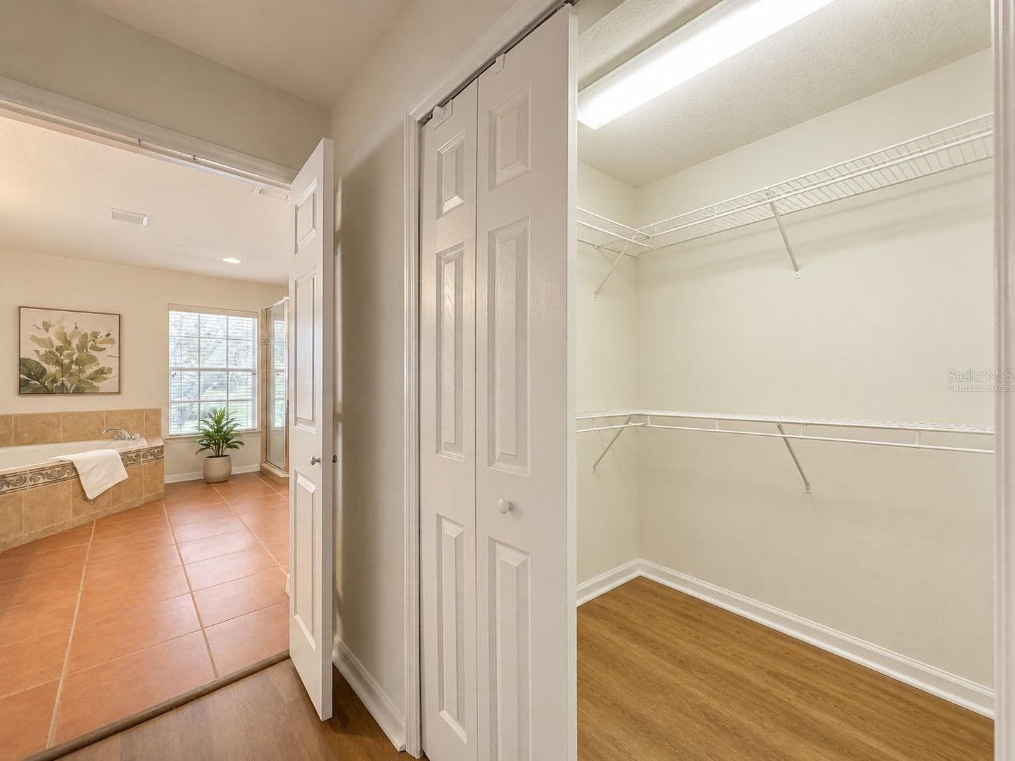 Virtually Staged Primary Closet 2 - 12912 CLOVERDALE LN, CLERMONT