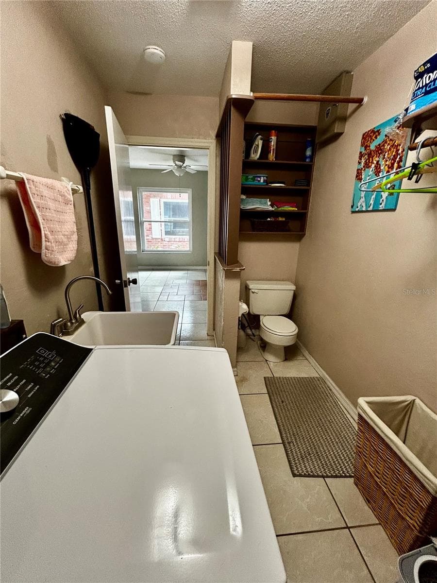laundry with utility sink and toilet - 2950 N SHELL RD, DELAND