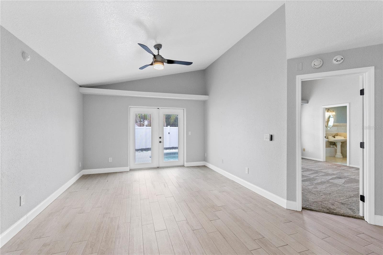 Dining area and doorway to Primary suite - 10057 SANDBAR ST, ORLANDO