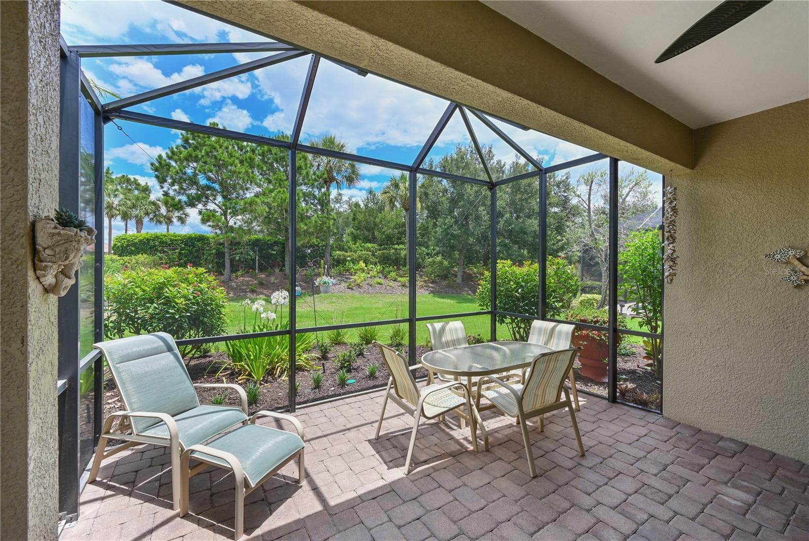 Expanded cage and covered lanai - 5007 SERATA DR, BRADENTON