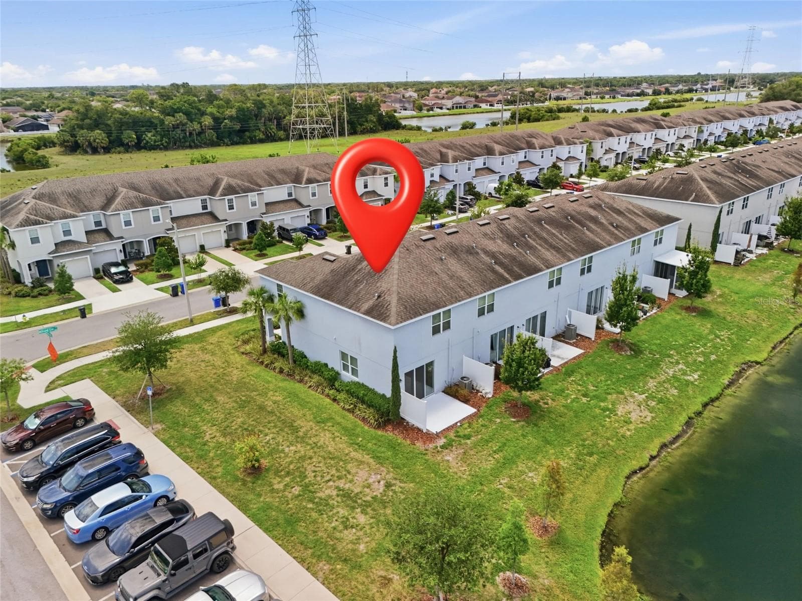 Additional aerial view highlighting the home's position along the water - 7005 GRAND ELM DR, RIVERVIEW