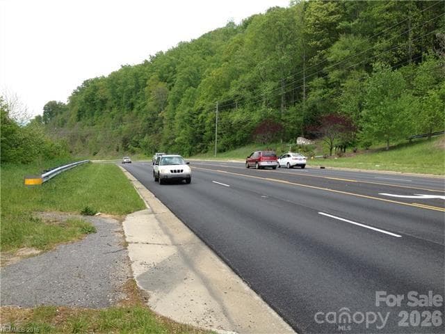 View of site clearance toward Ahseville from one of two entrances with center lane for ease of access. - Asheville