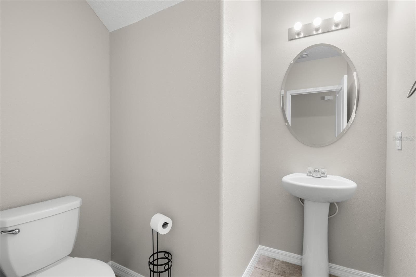 downstairs 1/2 bath - 36101 STABLE WILK AVE, ZEPHYRHILLS