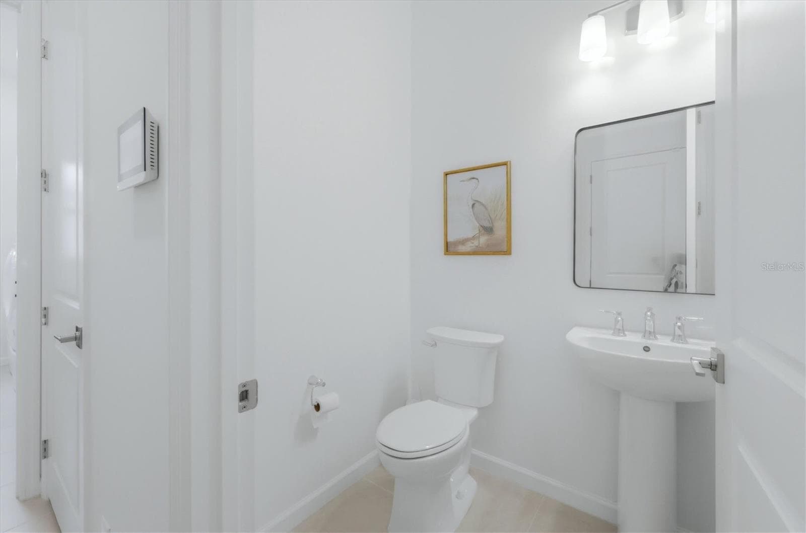 1/2 bath near garage/laundry - 29248 CORAL HARBOUR DR, ENGLEWOOD