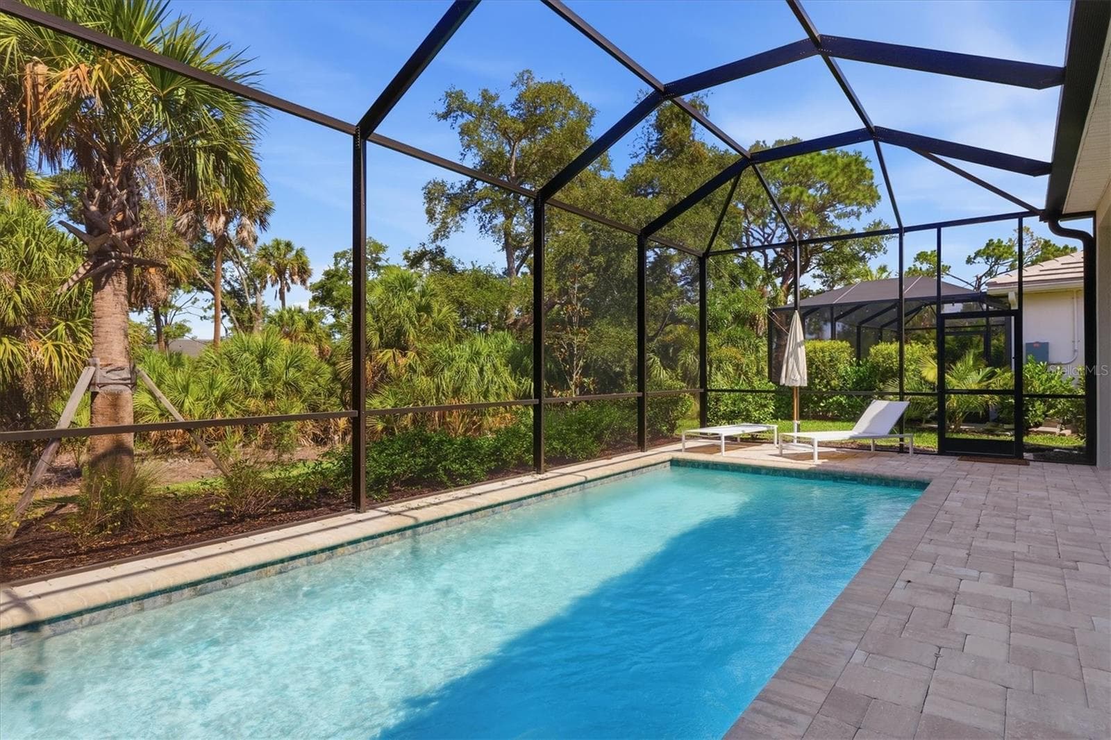 Saltwater pool with extended lanai - 29248 CORAL HARBOUR DR, ENGLEWOOD