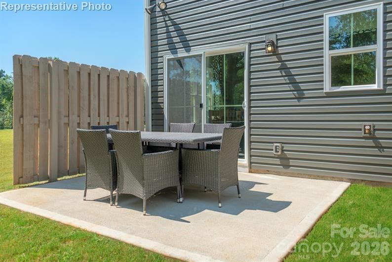 Fire up the grill! Enjoy BBQs, morning coffee, or evening chats on your spacious 10x12 back patio—your private outdoor escape! - 3906-2 15TH Street Drive NE, Hickory