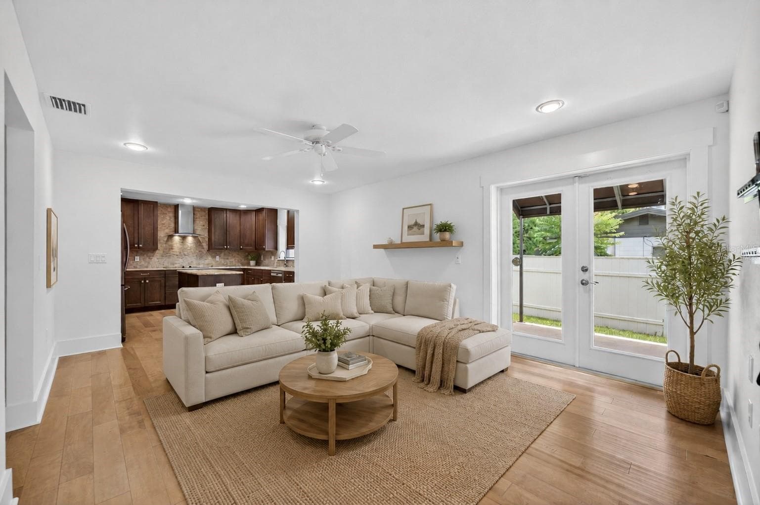 Open living room & kitchen - virtually staged - 1265 ARLINGTON PL, WINTER PARK