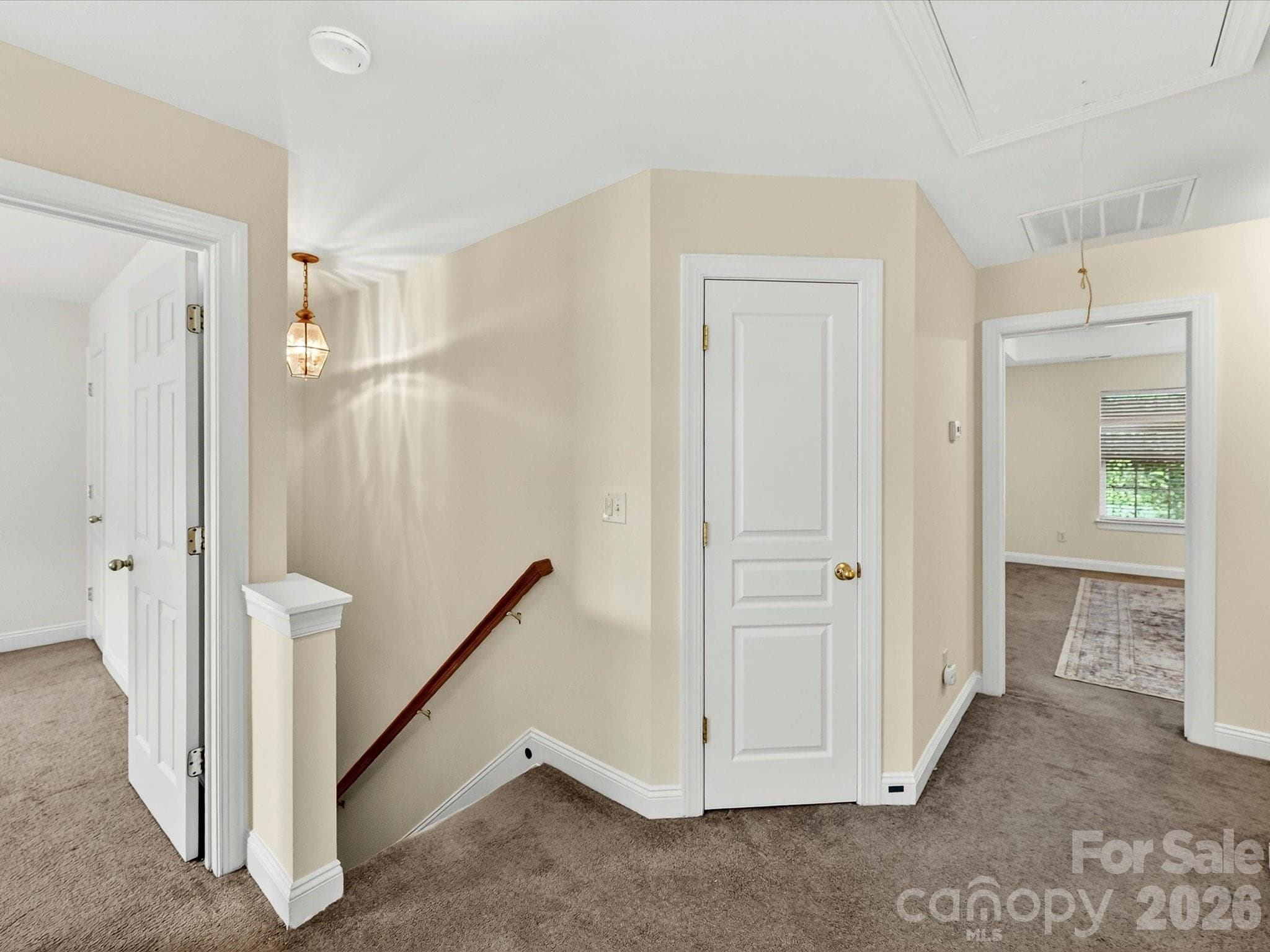 Spacious upper-level landing provides convenient access to the primary & secondary bedrooms and offers flexibility for a reading nook, study area, or additional living space. - Cornelius