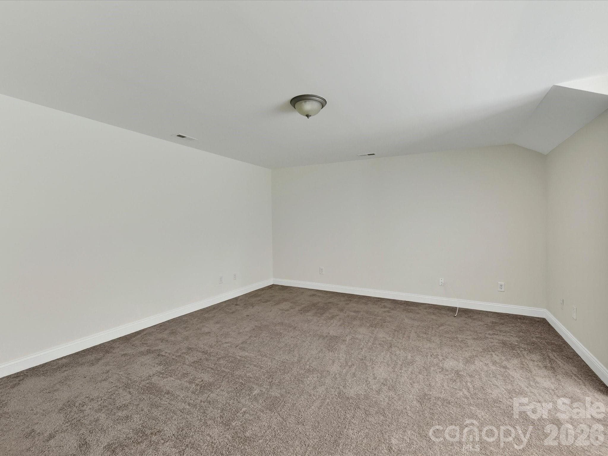 Expansive bonus room offers exceptional flexibility with ample space for a media room, playroom, home gym, office, or additional living area. - Cornelius