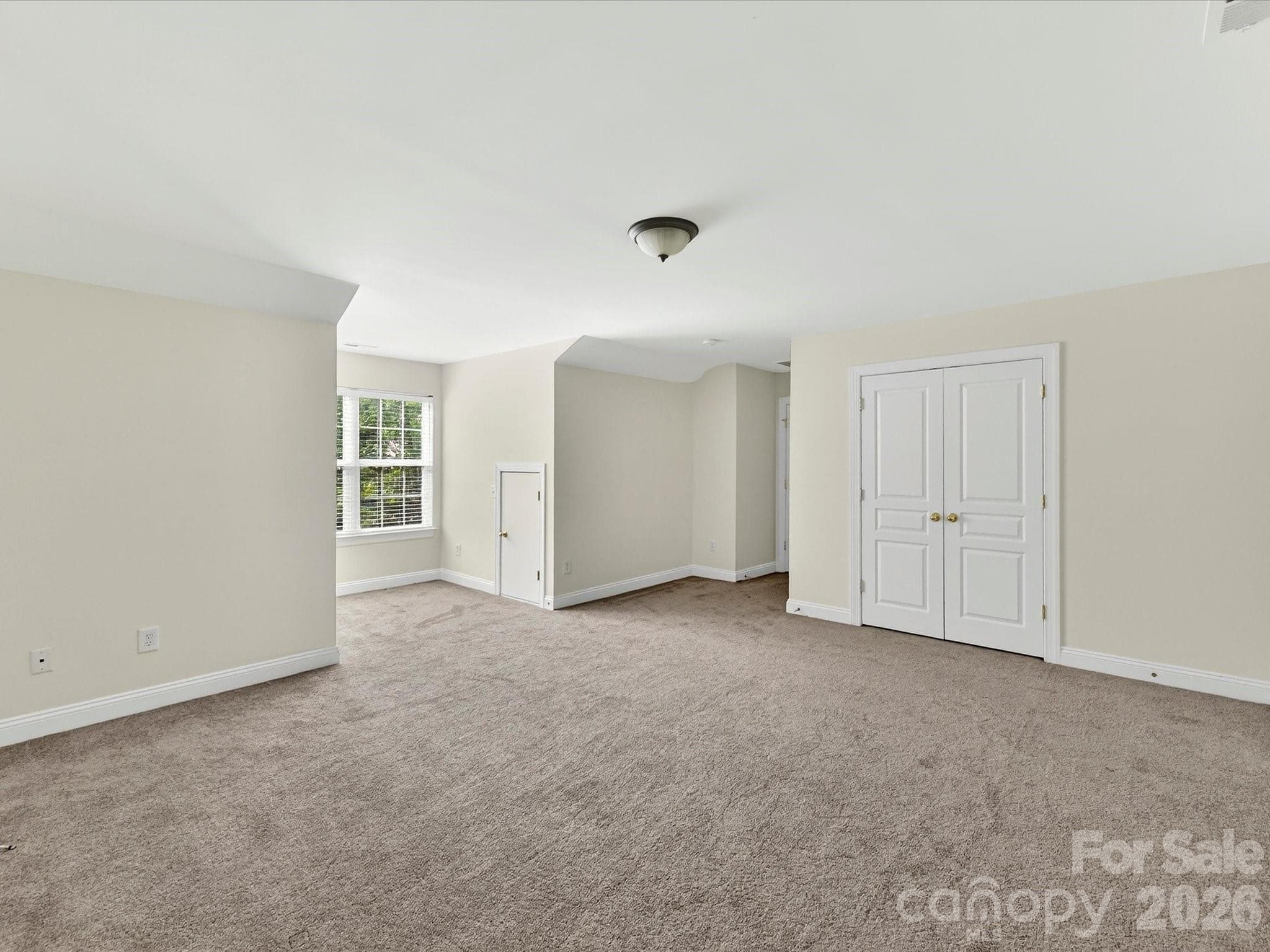 Expansive bonus room offers exceptional flexibility with ample space for a media room, playroom, home gym, office, or additional living area. - Cornelius