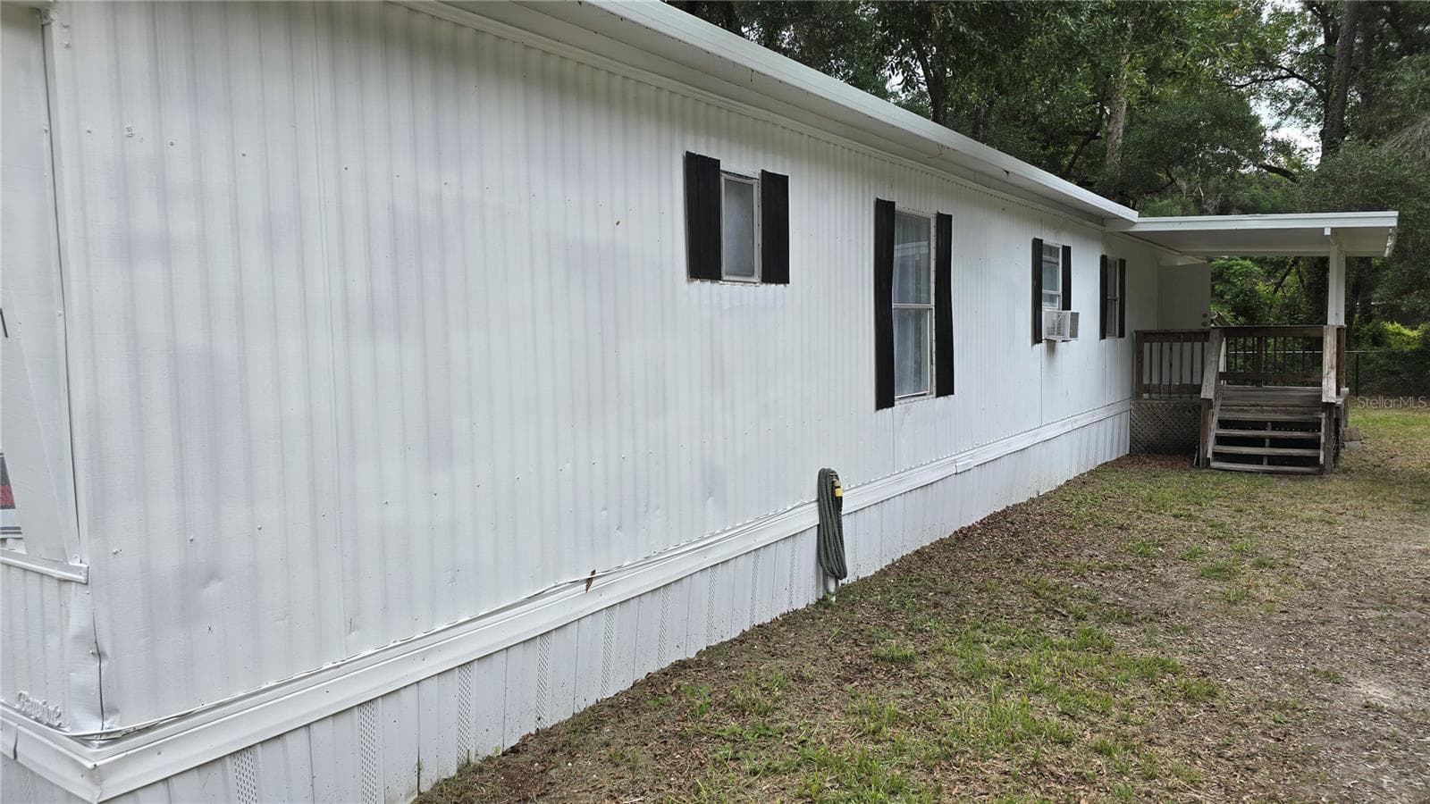 Manufactured Home at 201 NW 135TH AVE, OCALA, photo 4 of 41