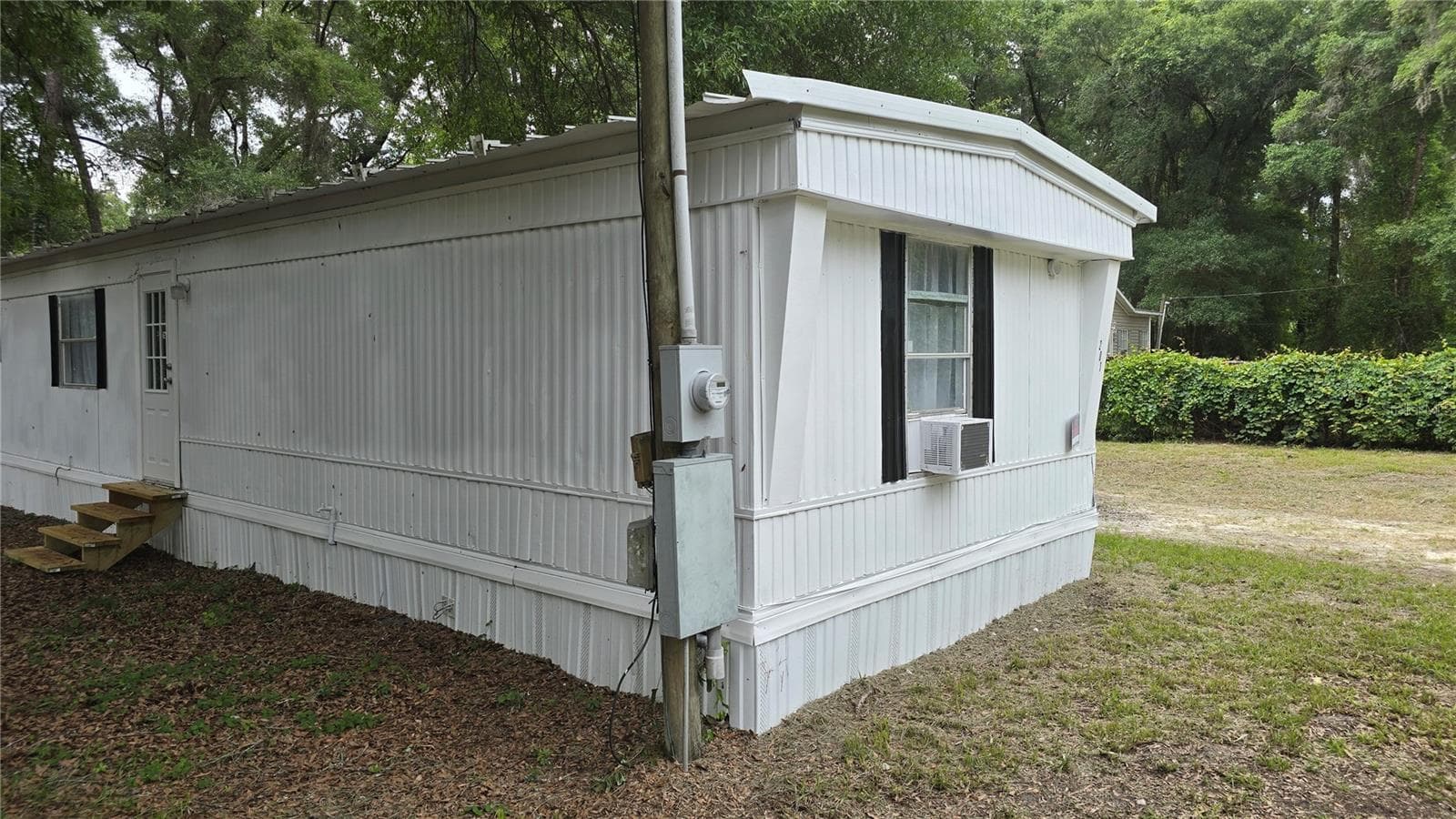 Manufactured Home at 201 NW 135TH AVE, OCALA, photo 5 of 41