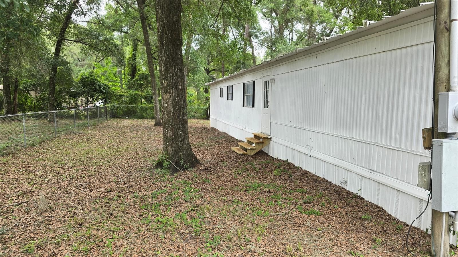 Manufactured Home at 201 NW 135TH AVE, OCALA, photo 6 of 41