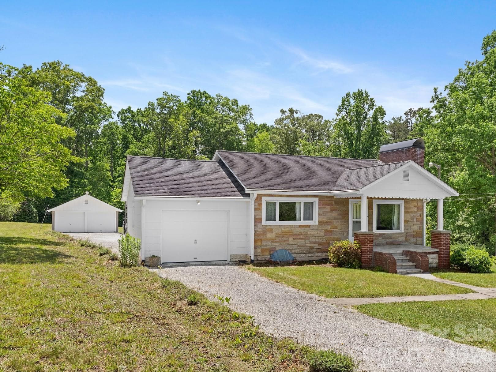 Front View showing detached garage behind - Hendersonville