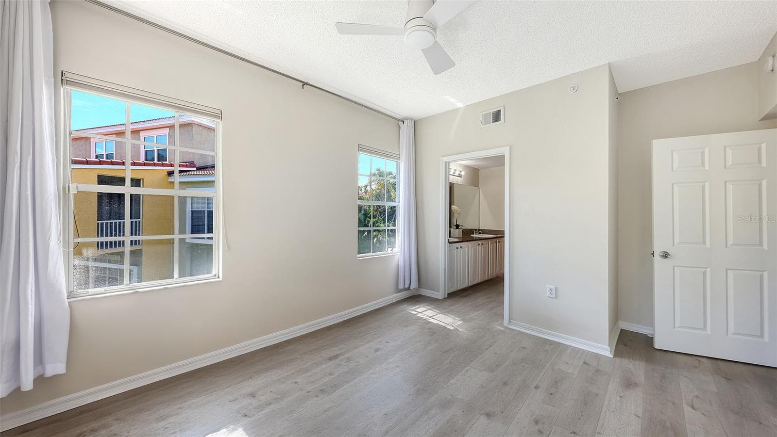 Primary bedroom - 5551 BENTGRASS DR #11-117, SARASOTA
