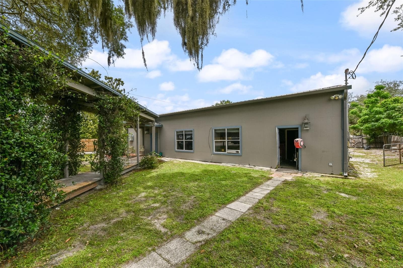 Dwelling Unit 2 and 3 are in a large building and each have their own separate entrance. There is also a large storage room (door you see here) - 2036 LAKE VIEW AVE, CHULUOTA