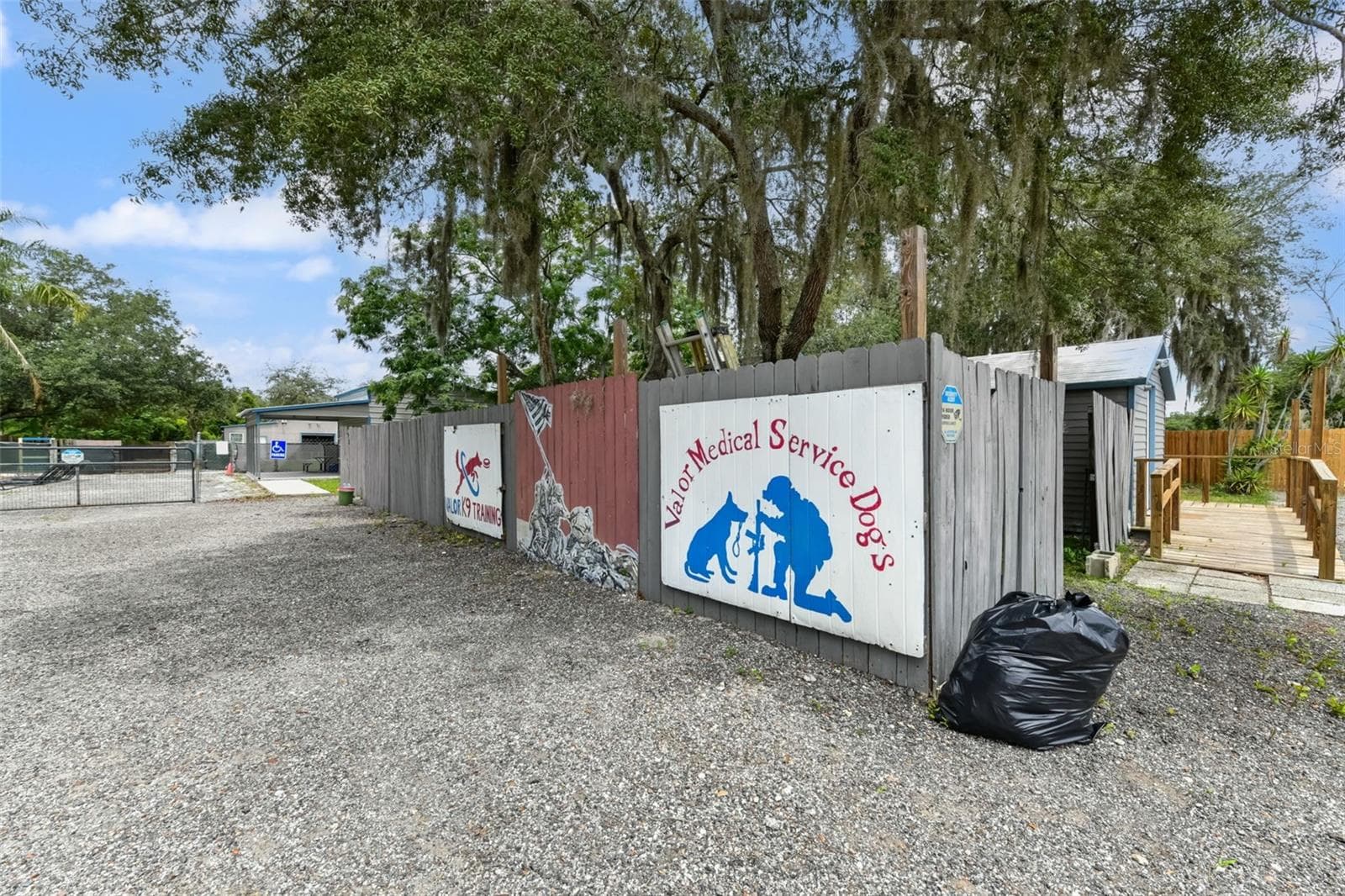 Making our way further back down the property towards Dwelling Unit #4 that could also be a workshop or storage - 2036 LAKE VIEW AVE, CHULUOTA