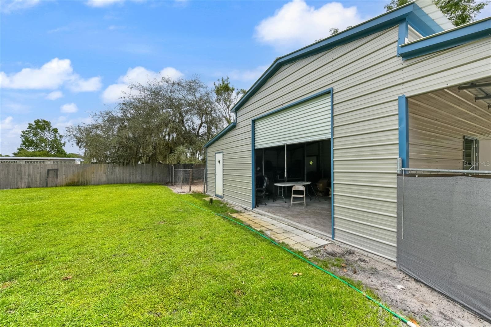 Roll up door for Building 4. Perfect for large boat parking! - 2036 LAKE VIEW AVE, CHULUOTA