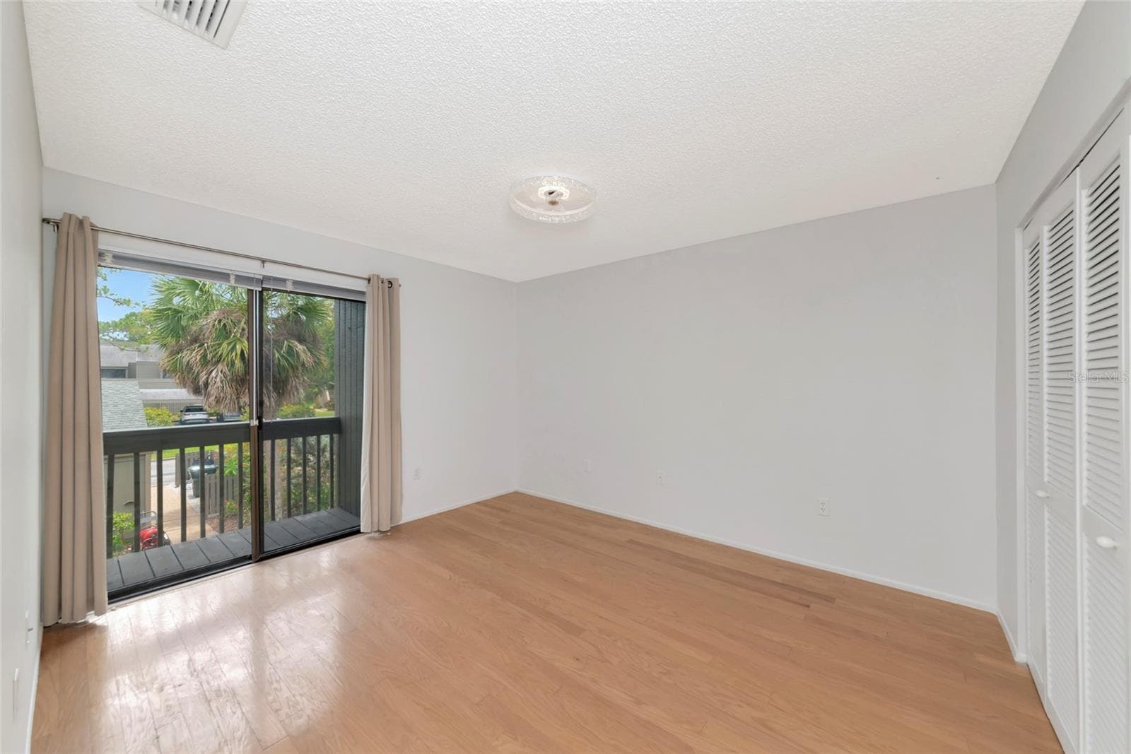 Second Bedroom with Balcony - 116 WOODLAND PL #116, OSPREY