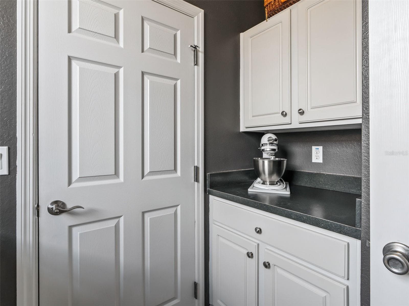 Inside Laundry Rm w/Additional Counter space & Cabinets - 12421 SE 174TH LOOP, SUMMERFIELD