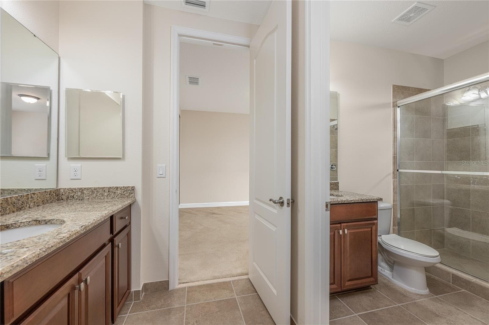 Jack n Jill bathroom looking at second bedroom - 10751 BELFRY CIR, ORLANDO