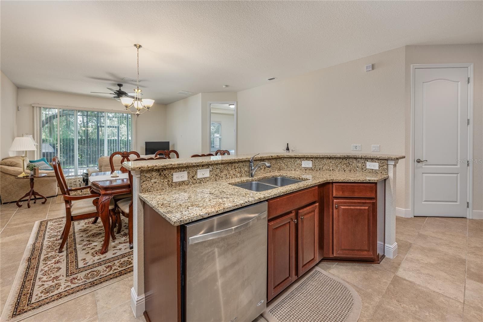 Spacious kitchen looking towards living room - 10751 BELFRY CIR, ORLANDO