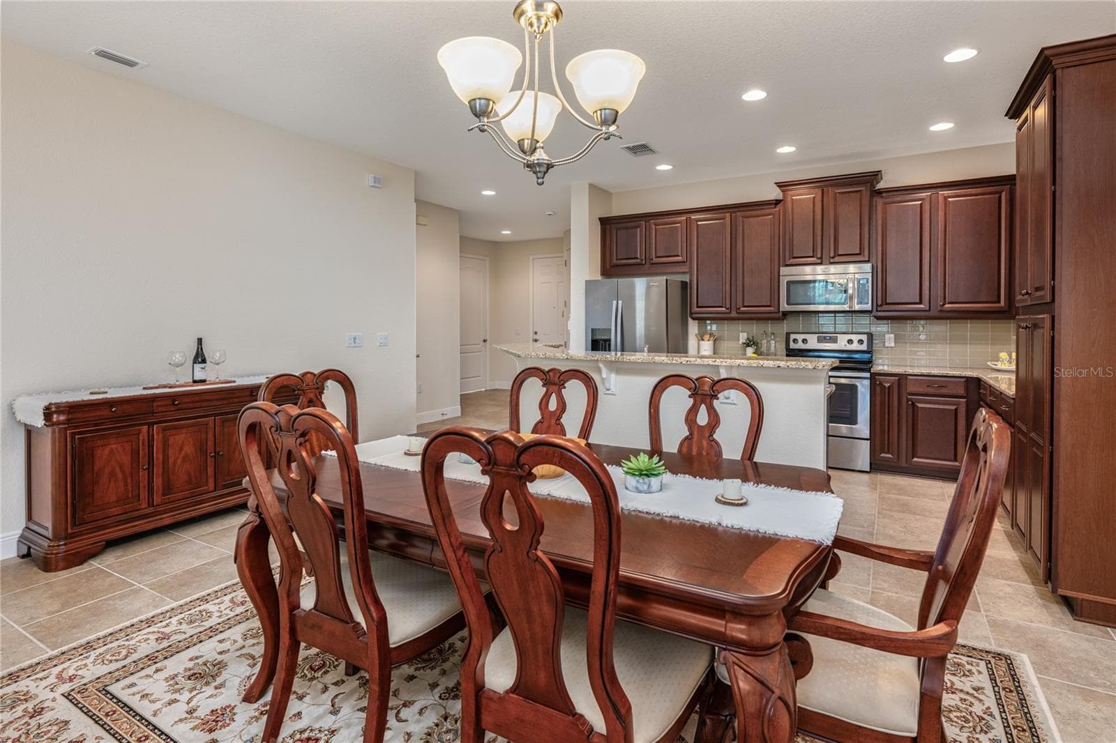 Dining room and kitchen view - 10751 BELFRY CIR, ORLANDO