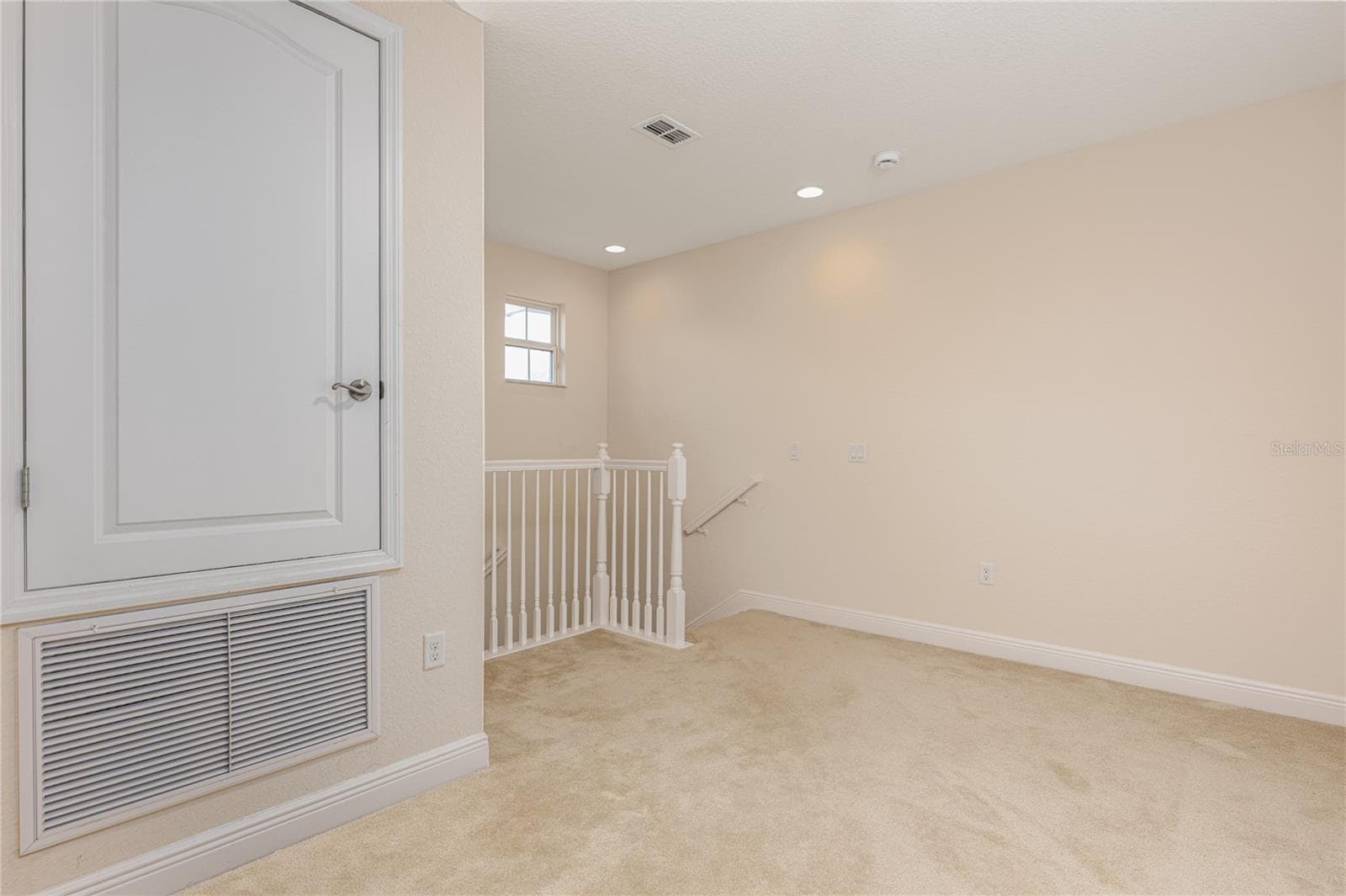 Flexible loft space other view, perfect for a home office, fitness area, reading nook, or media lounge - 10751 BELFRY CIR, ORLANDO