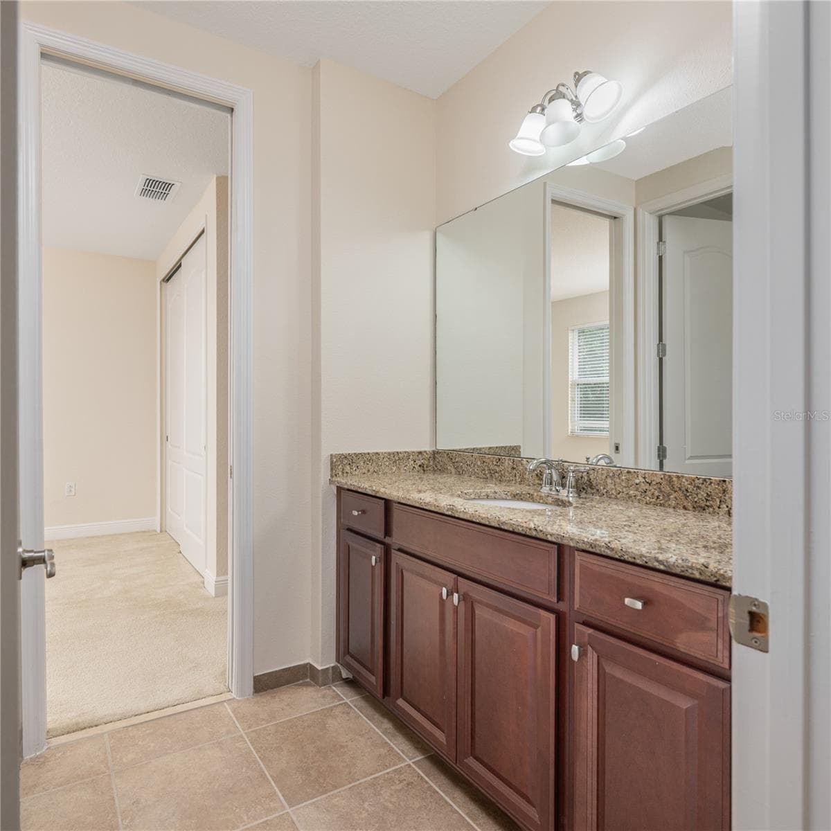 Jack n Jill bathroom looking at third bedroom - 10751 BELFRY CIR, ORLANDO