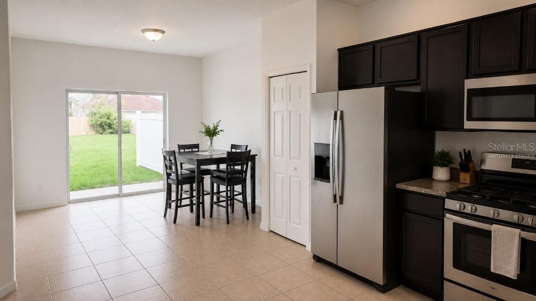 Virtually staged - 828 ABBEVILLE CT, KISSIMMEE