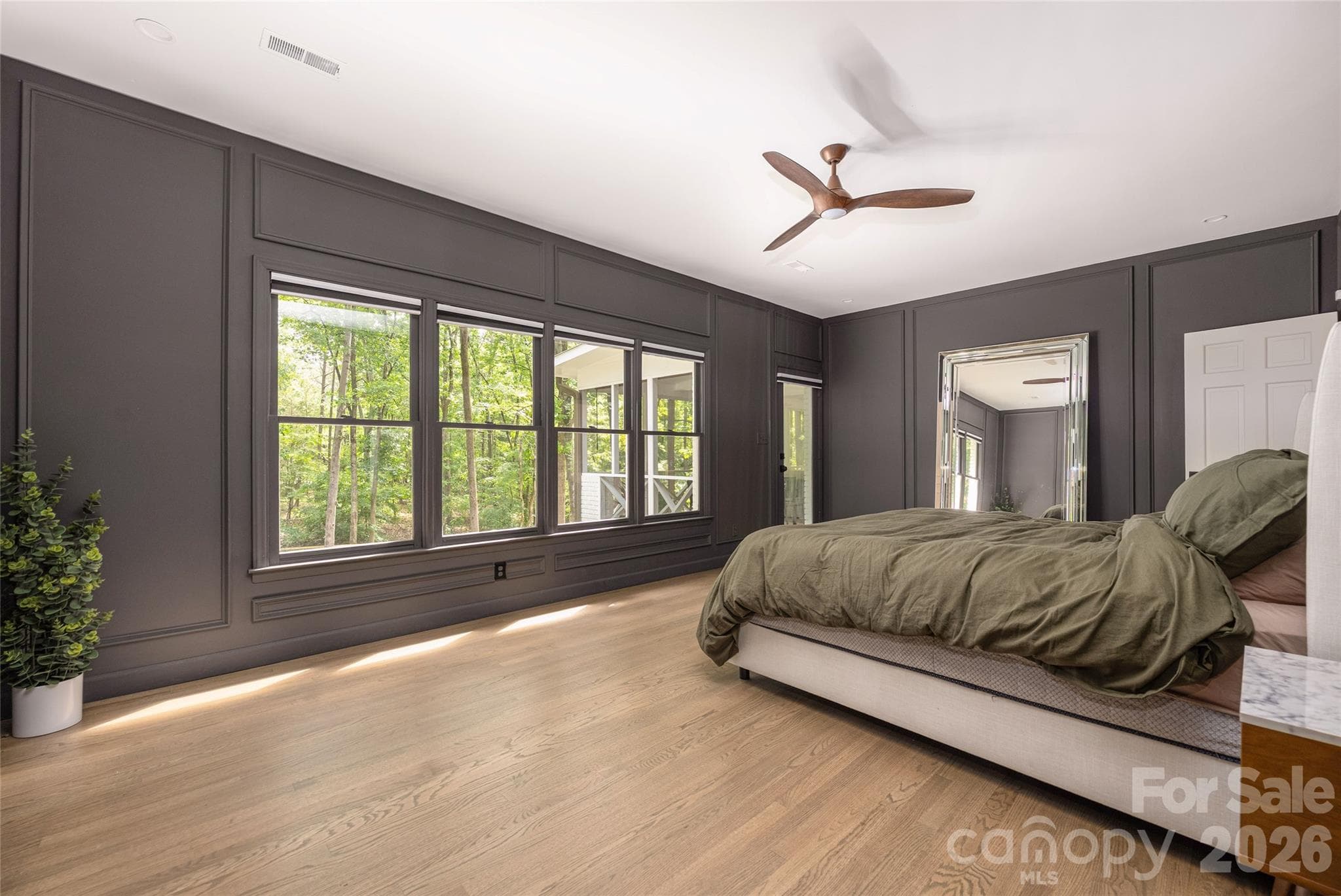 Primary bedroom surrounded by trees and privacy - 1800 Chestnut Lane, Matthews