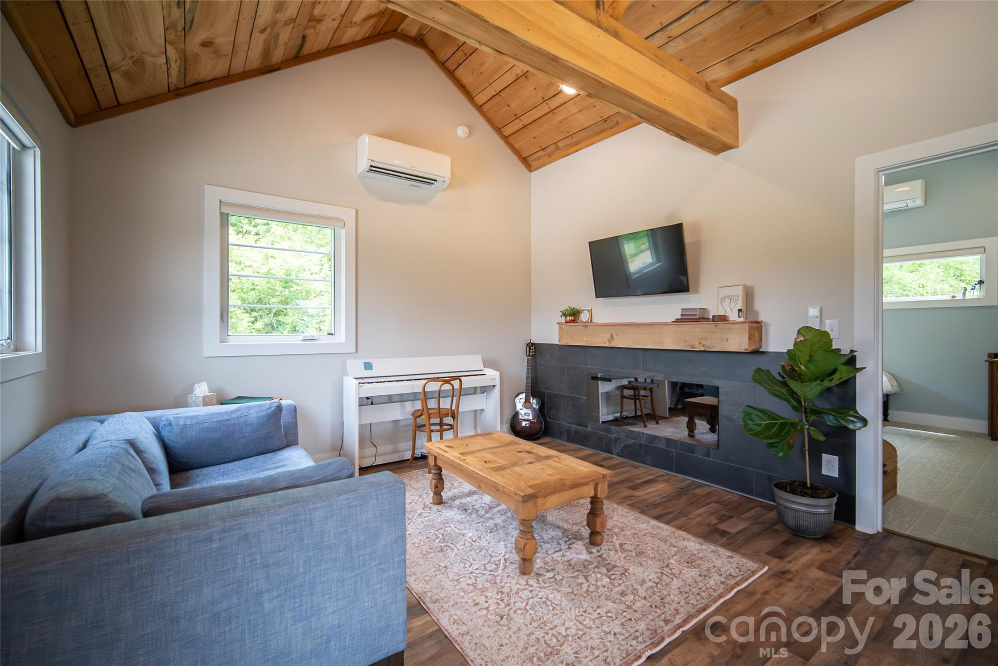 Inviting guest cabin interior blends comfort, character, and functionality. - 23 Benton Farms Lane, Horse Shoe