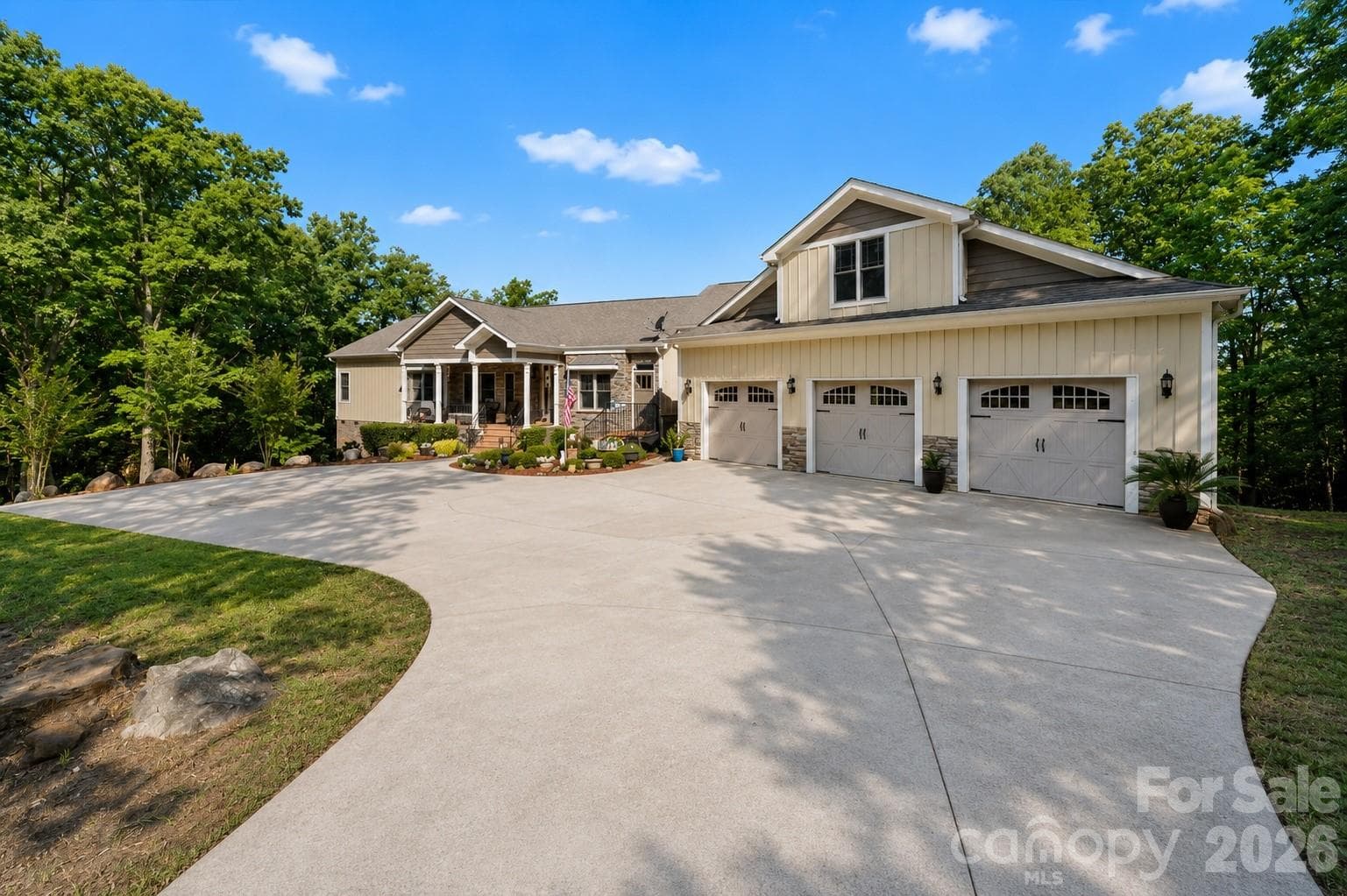 Spacious 3-bay garage with expansive parking area - 2207 Sierra Trace Road, Denton