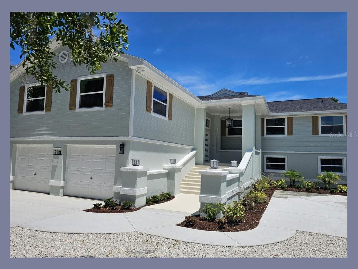 Front of Home with new Roof, Hardie Siding, and Concrete Driveway - 860 LAMBERT AVE, FLAGLER BEACH