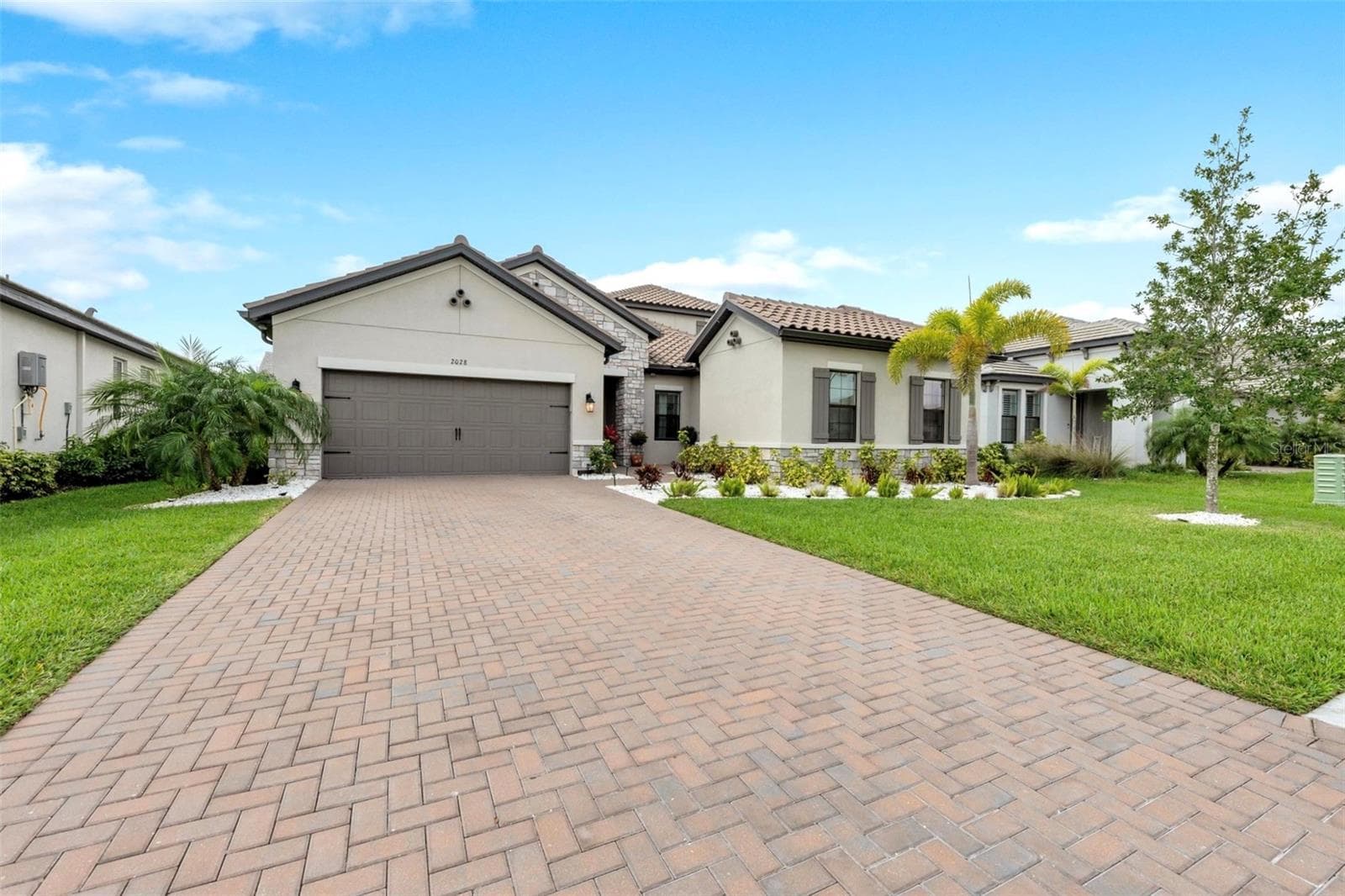 Single Family Residence at 2028 WOODLEAF HAMMOCK CT, BRADENTON, photo 2 of 38